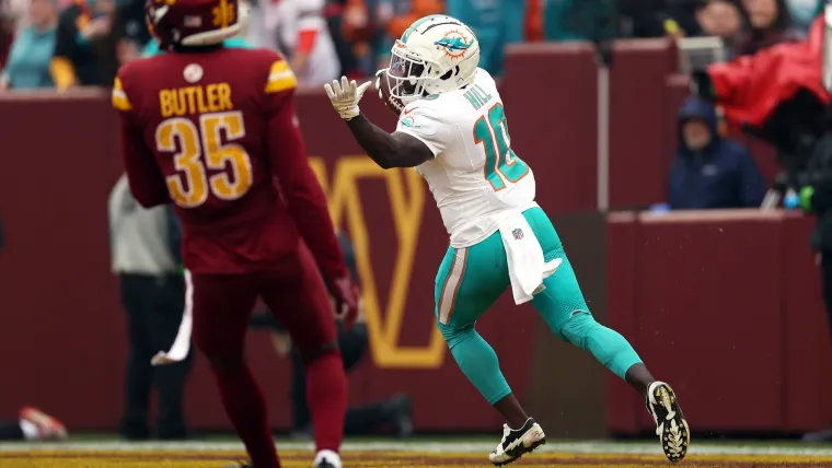 Selebrasi Tyreek Hill setelah mencetak touchdown untuk Miami Dolphins dalam laga melawan Commanders